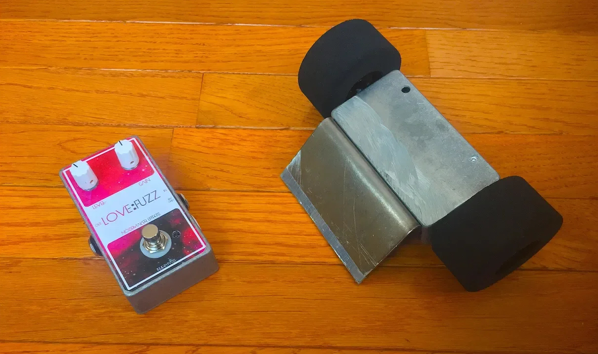 Stomp Bot 1 next to actual guitar pedal